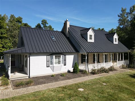 black metal roof house|black standing seam metal roofing.